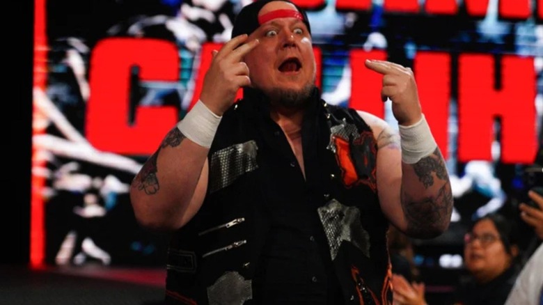 Sami Callihan heads down to the ring to put his career on the line against Mike Santana in a match at a TNA pay-per-view in 2025.