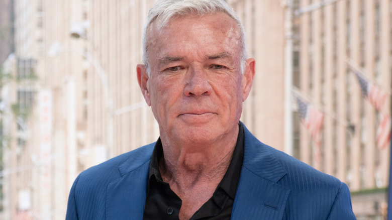 Eric Bischoff wearing a suit