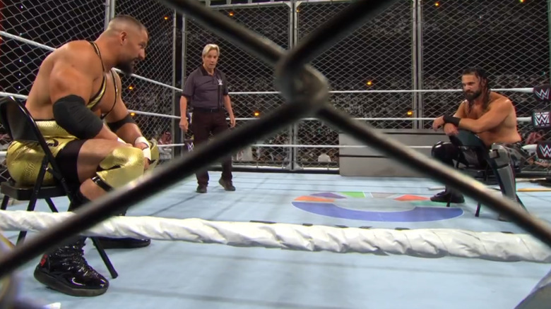 Bron Breakker and Seth Rollins stare eachother down