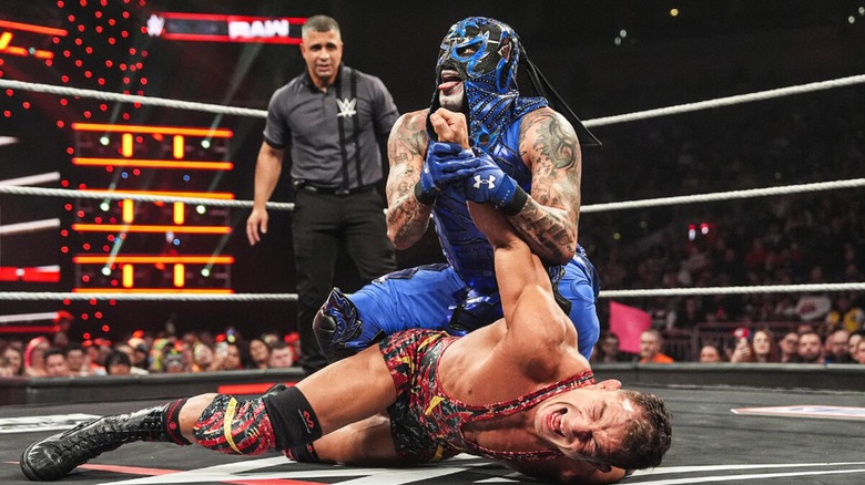 Chad Gable being locked into an armbar by Penta during their clash on "RAW."