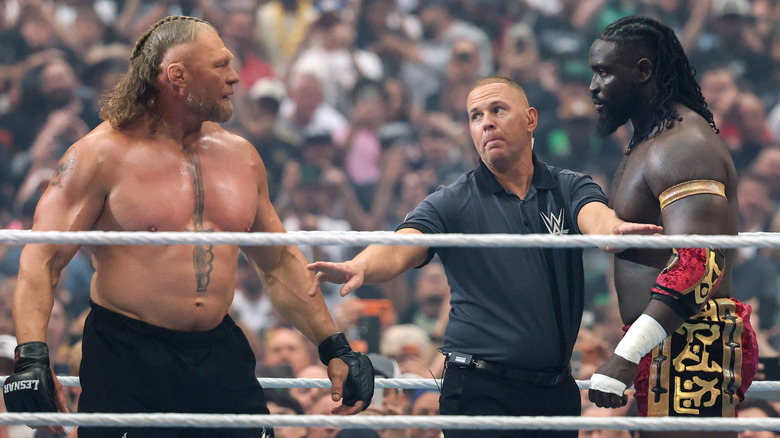 Brock Lesnar and Oba Femi stare at each other before their match during WrestleMania 42
