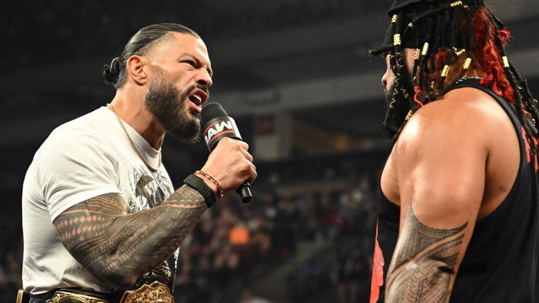 World Heavyweight Champion Roman Reigns cuts a promo on Jacob Fatu in the ring during an episode of "WWE Raw."