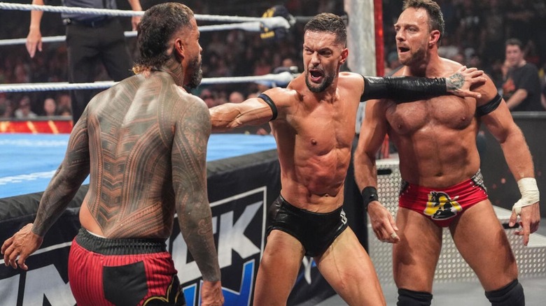 Finn Balor separates Jey Uso and LA Knight on the outside of the ring during their King of the Ring four-way match on the June 12, 2026 edition of "WWE SmackDown."