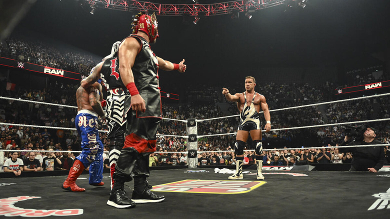 Chad Gable in the ring pointing to Rey Mysterio, Penta, and Dragon Lee on "WWE Raw"