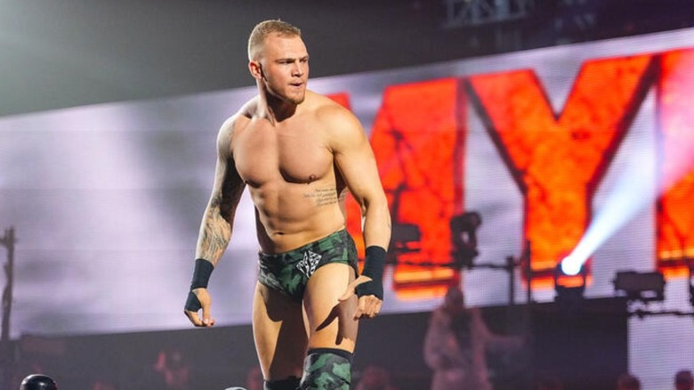 Myles Borne stands on the ropes during his entrance before a match on "WWE NXT."