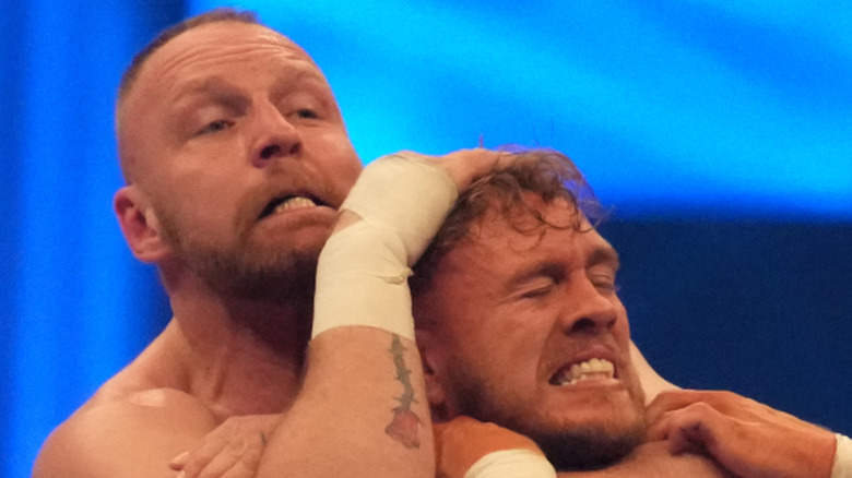 Jon Moxley chokes Will Ospreay