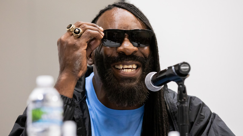 Booker T smiling with sunglasses on