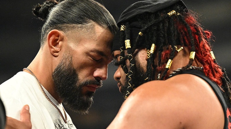 Roman Reigns and Jacob Fatu touch foreheads on "WWE Raw"