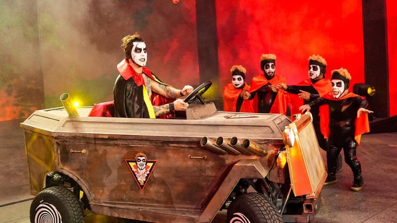 Danhausen, in the Danhausen-mobile, leads the Minihausens down to the ring during a segment at WWE WrestleMania 42.