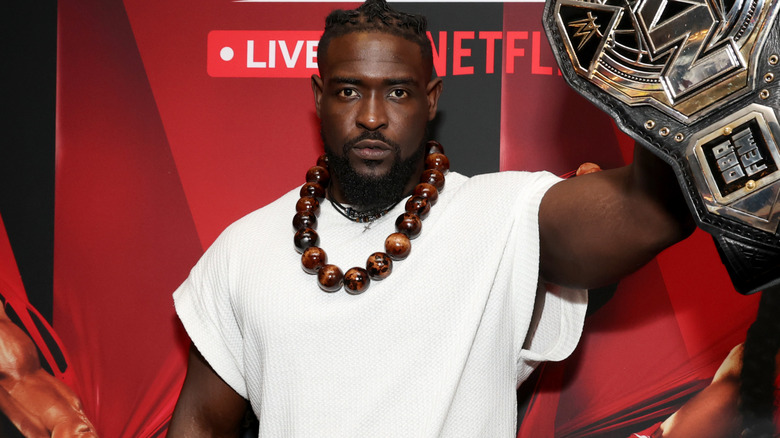 Oba Femi holding the NXT Championship