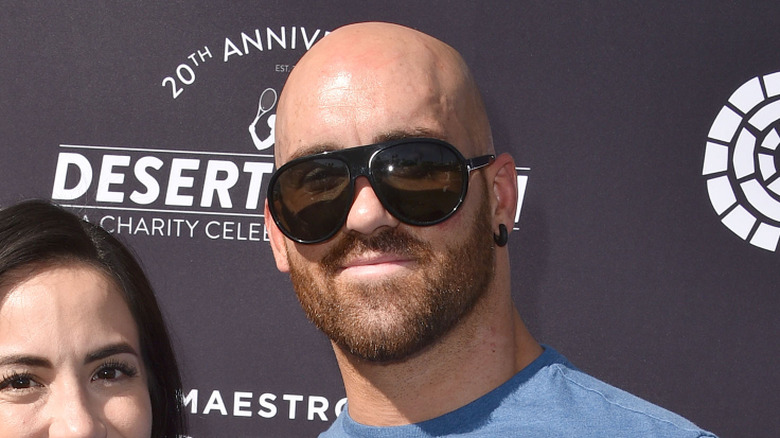 Fabian Aichner wearing giant sunglasses