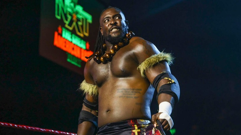 NXT Champion Oba Femi stands with the title in the ring ahead of a match at "WWE NXT" Great American Bash 2025.