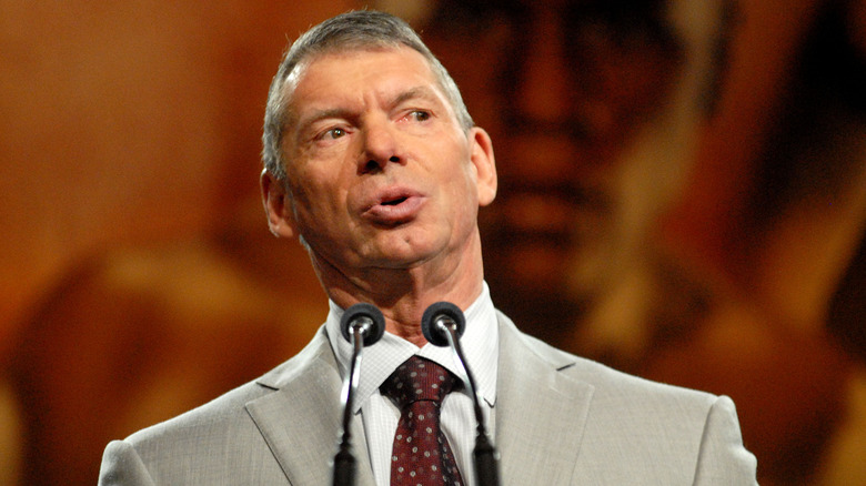 Former WWE CEO and Chairman Vince McMahon awaits a question from the press