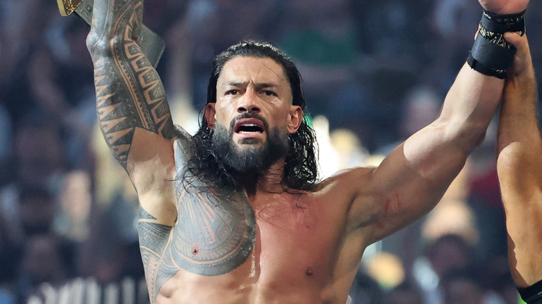 Roman Reigns celebrating the arrival of another cousin