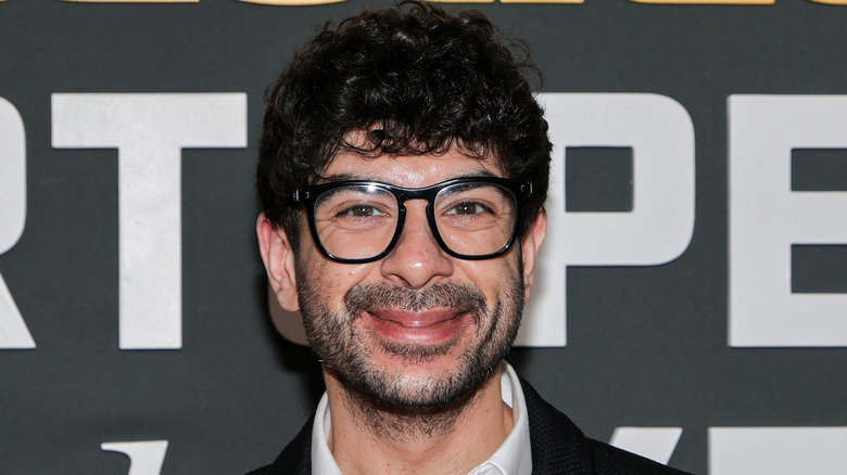 Tony Khan looking happy
