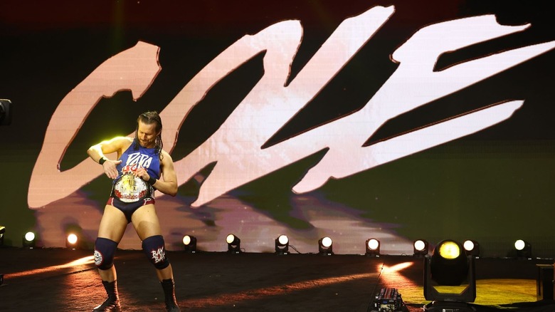Adam Cole wearing the TNT Championship