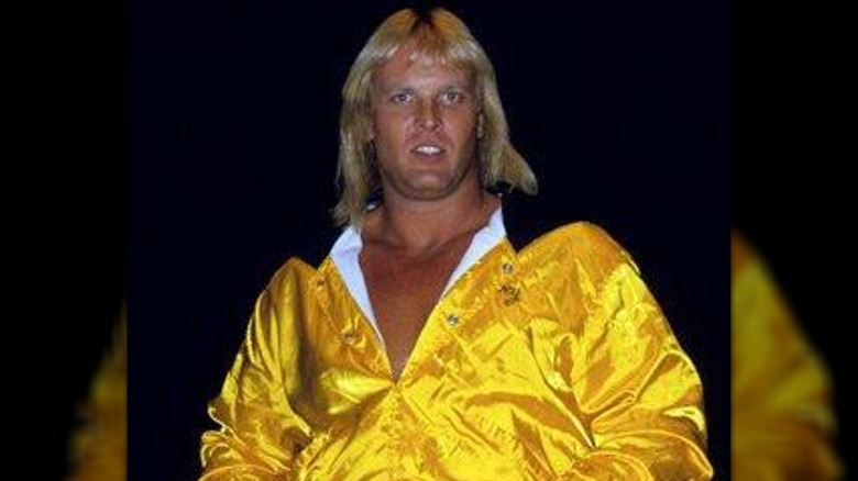 Dan Spivey in ring during his blonde hair/yellow attire era.