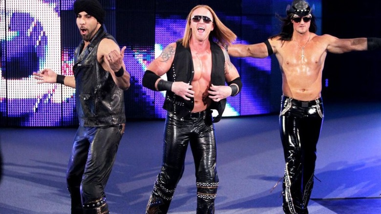 Jinder Mahal, Heath Slater, and Drew McIntyre make their entrance as 3MB before a match on WWE programming.