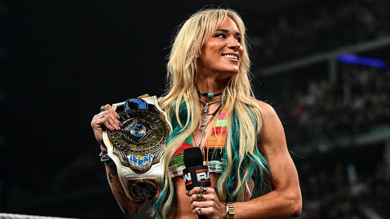 Sol Ruca celebrating with the WWE Women's Intercontinental Championship after defeating Becky Lynch at Clash in Italy.