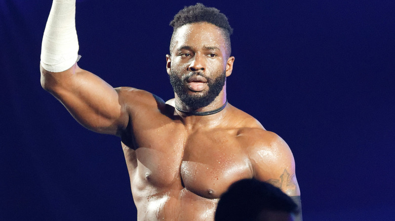 Cedric Alexander raising his arm