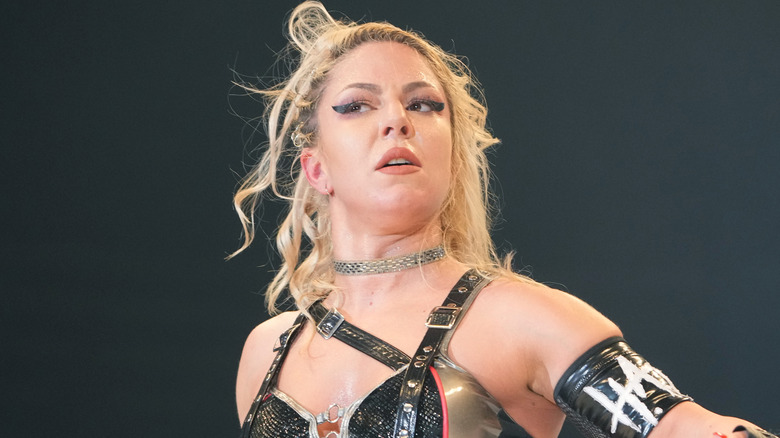 Thekla wearing a silver choker necklace