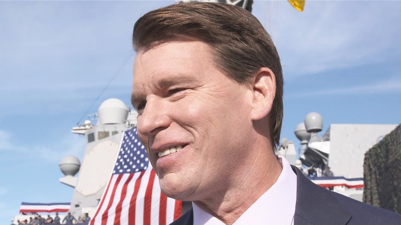 JBL smiling during an exclusive interview with WWE.com talking about the importance of Tribute to the Troops.