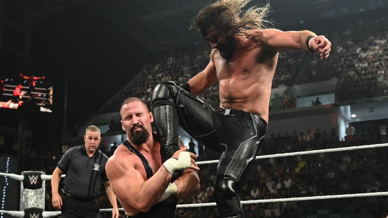 Seth Rollins hits a knee to the face of Bron Breakker in the middle of the ring during the June 1, 2026 edition of "WWE Raw."