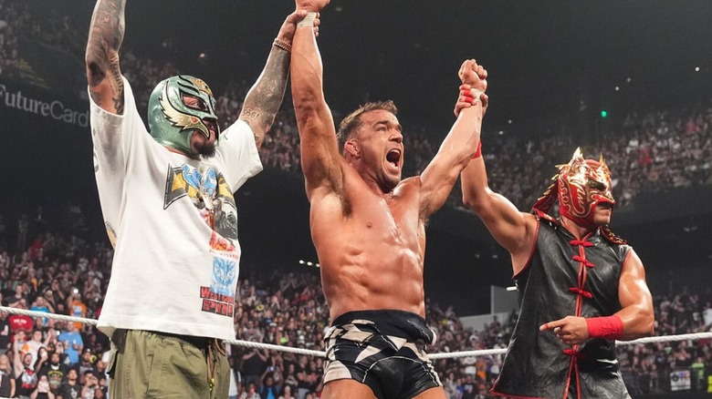 Chad Gable and Dragon Lee hold up the arms of Chad Gable in the ring after Gable defeated Rusev on the June 15, 2026 edition of "WWE Raw."