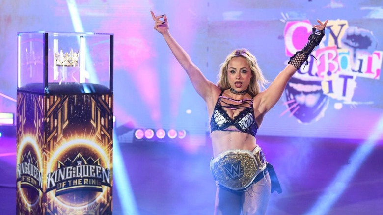 WWE Women's World Champion Liv Morgan struts down to the ring, beside the Queen of the Ring Crown, ahead of a four-way match in the tournament on the June 8, 2026 edition of "WWE Raw."