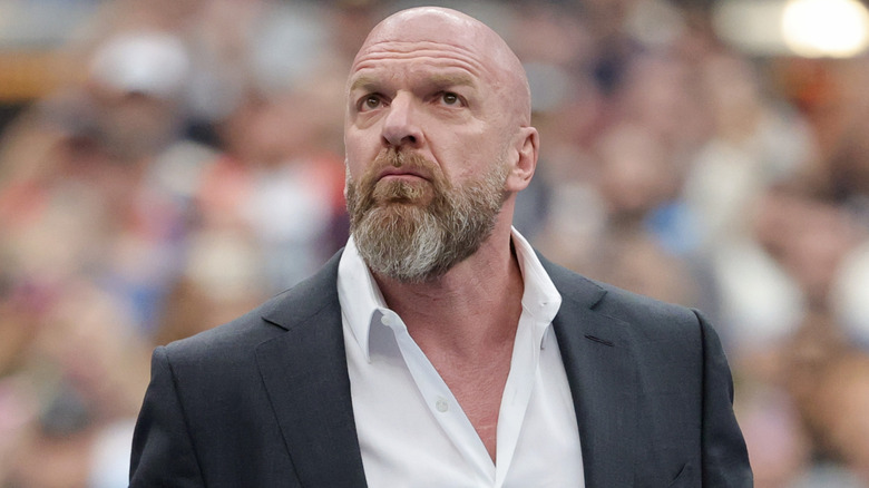 Triple H wearing a suit
