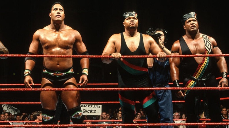 The Rock, D'Lo Brown, and Ron Simmons