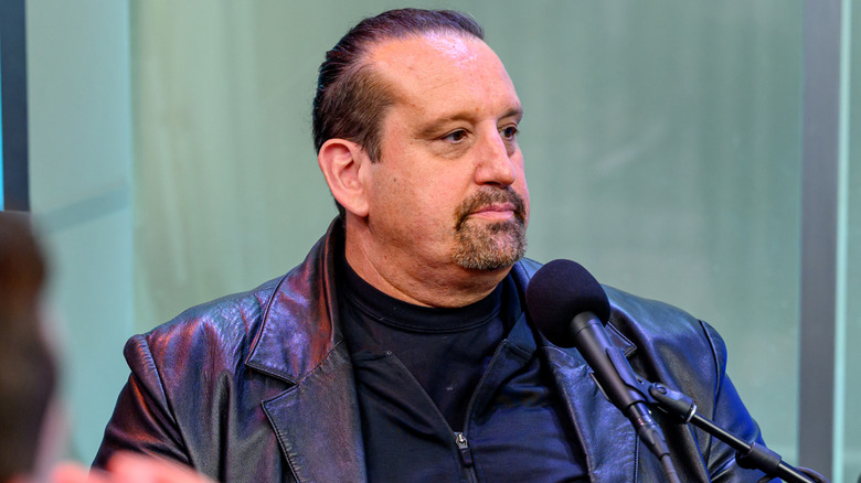 Tommy Dreamer wearing a leather jacket