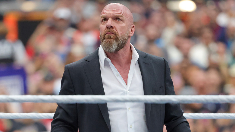 WWE CCO Triple H takes in the admiration of the crowd before welcoming them to WrestleMania