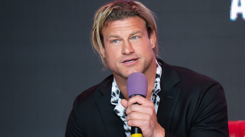 Nic Nemeth holding a microphone