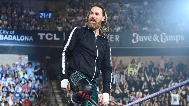 Sami Zayn poses on the ropes before a match on an episode of "WWE SmackDown."