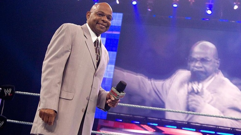 Teddy Long stands in an ECW ring as its on-screen general manager