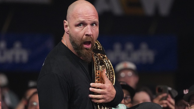 Jon Moxley moving through the audience during an episode of "AEW Dynamite," with the AEW Continental Championship.