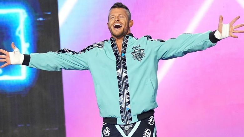 Matt Sydal wearing a turquoise jacket
