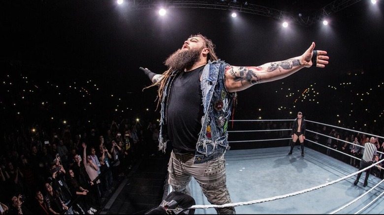 Former WWE star Bray Wyatt takes in the admiration from the crowd before facing Finn Balor
