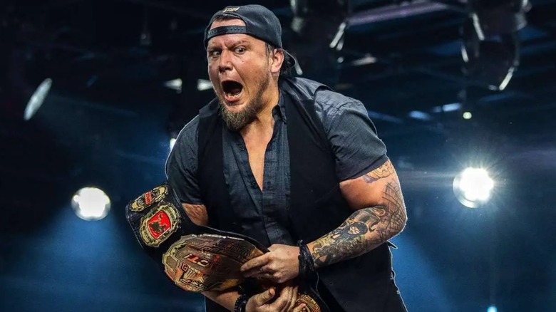 Sami Callihan holds on to the former Impact World Championship