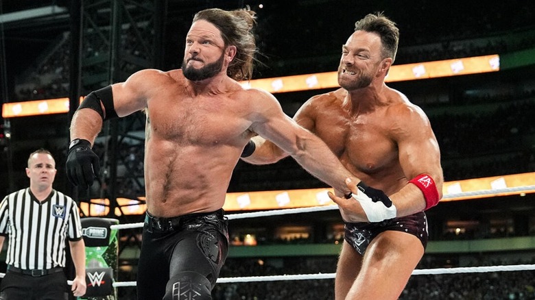 AJ Styles and LA Knight in the ring