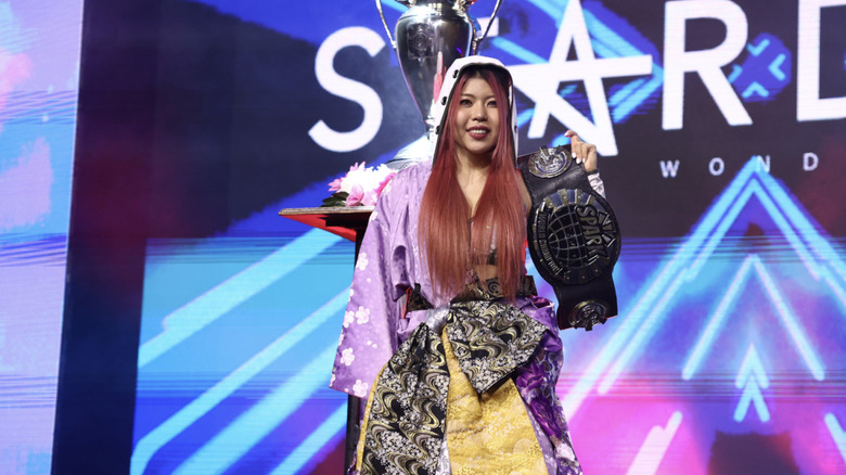 Hazuki on the entrance ramp with her SPARK Joshi World Championship belt