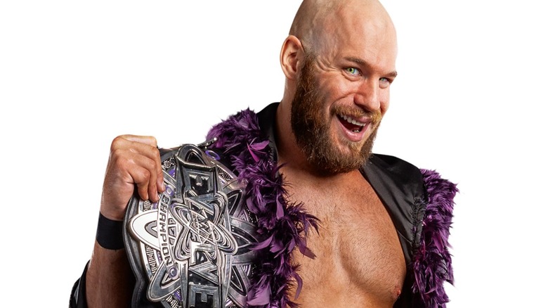 Aaron Rourke poses with the EVOLVE Championship