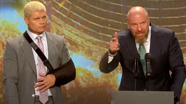 Cody Rhodes and Triple H on stage