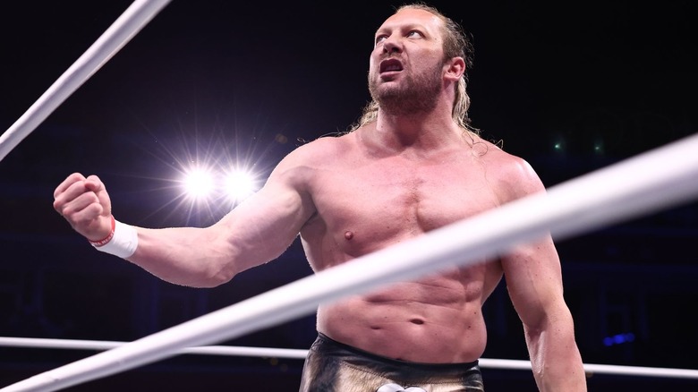 Kenny Omega poses on 