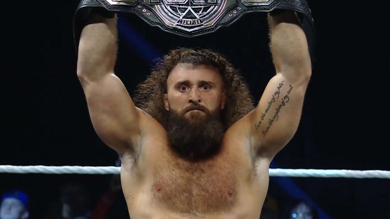 Tony D'Angelo holding the NXT Championship