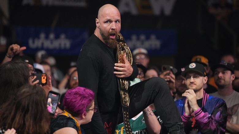 Jon Moxley heads down to the ring, the AEW Continental Championship over his shoulder, before a segment on AEW programming.