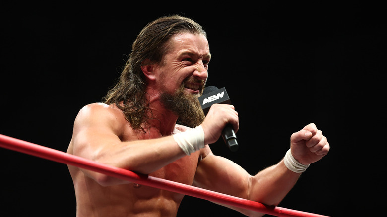 Jay White cuts a promo in the ring during an episode of 