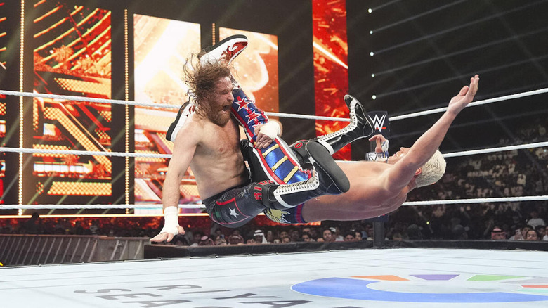 Sami Zayn hits Cody Rhodes with a Blue Thunder Bomb