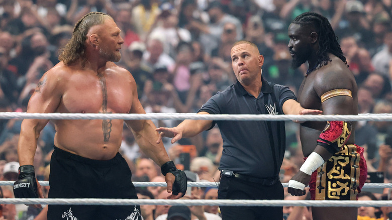 Brock Lesnar (L) and Oba Femi stare at each other before their match during WrestleMania 42 at Allegiant Stadium on April 19, 2026 in Las Vegas, Nevada.
